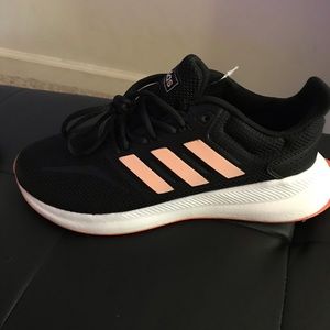 Adidas Falcon Run Sz. 6y and fits 7.5 women. Black with light orange.